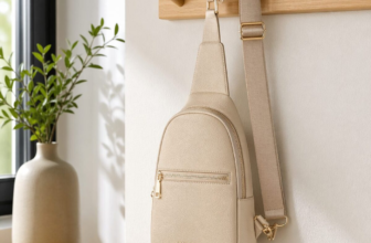 BOSTANTEN small sling bag in beige leather hanging on coat hook