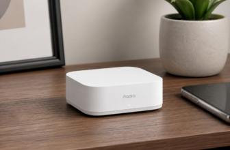 Aqara Smart Hub M200 on wooden desk with plant and smartphone
