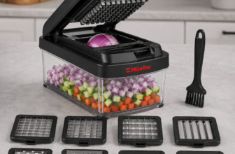 Mueller Pro-Series 10-in-1 Vegetable Chopper in black with 8 blades on kitchen countertop