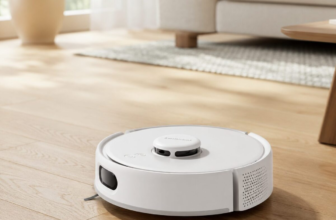 SwitchBot K10+ Pro Mini Robot Vacuum on hardwood floor in modern living room
