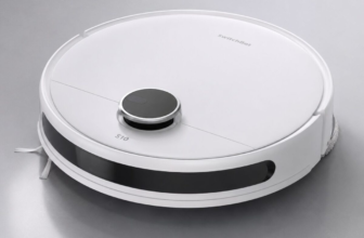 SwitchBot S10 white round robot vacuum and mop on light gray floor