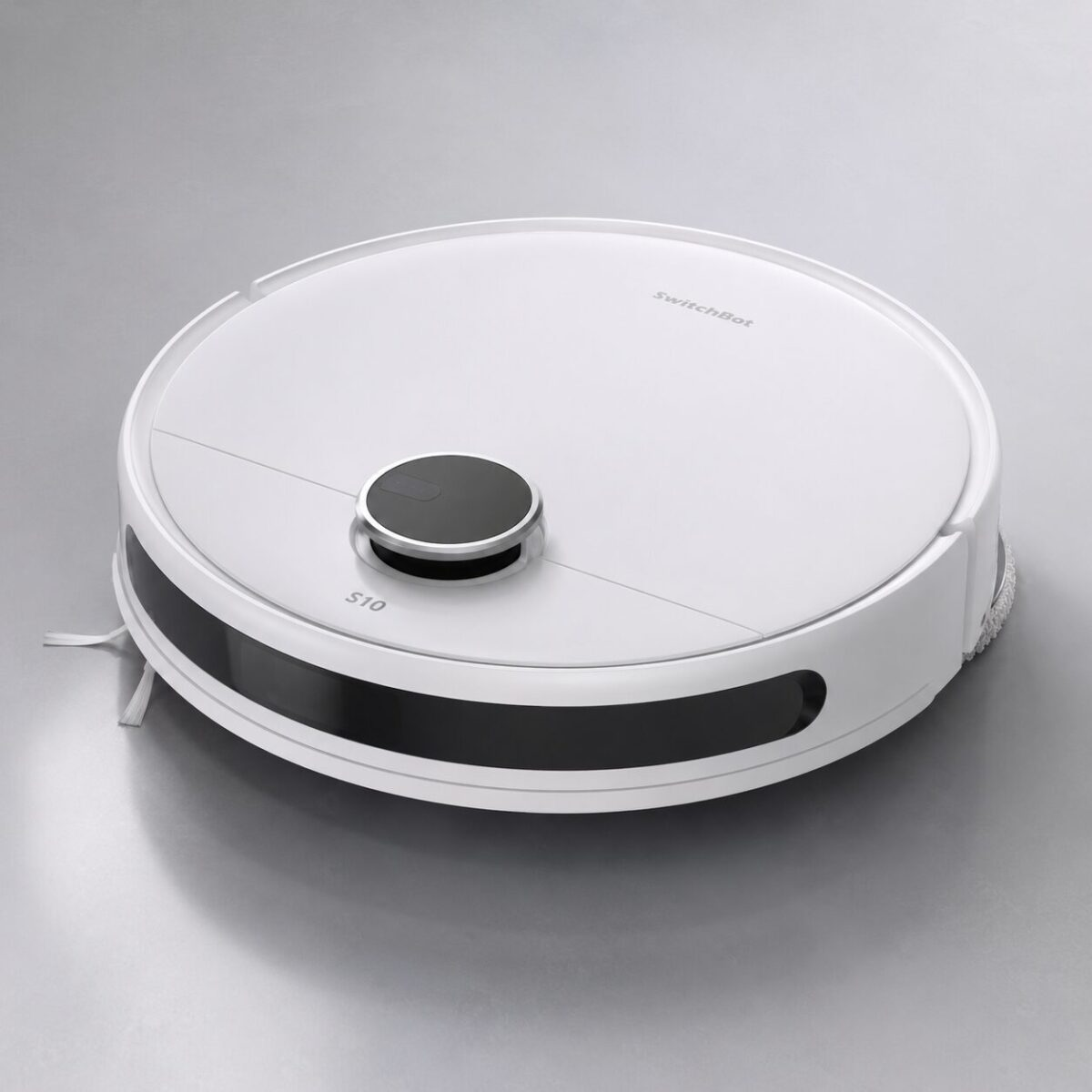 SwitchBot S10 white round robot vacuum and mop on light gray floor